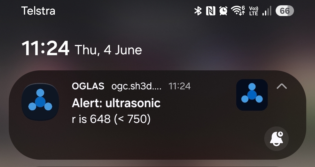 A push alert on a phone — ultrasonic level below threshold